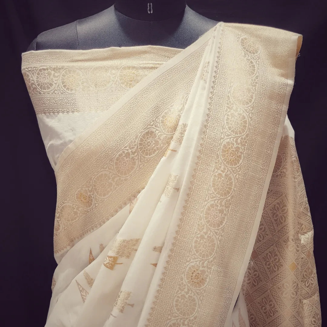 Banarasi Style Border Dola Silk Half White (Cream) color Banarasi Saree.